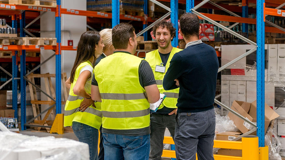 warehouse-logistics-workers-meeting